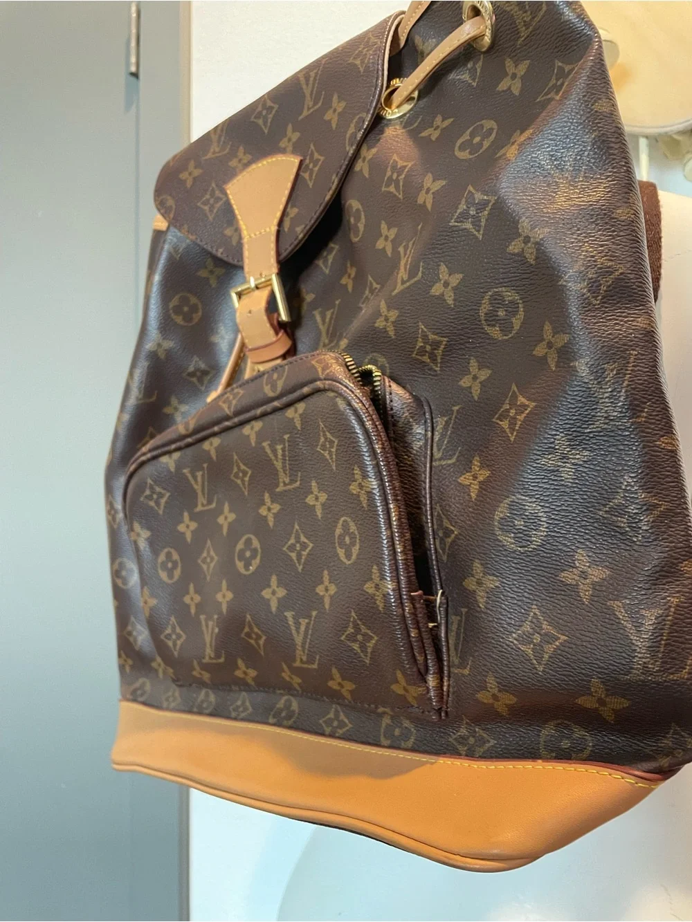 Brown Monogram Canvas Backpack broken from pocket zipper